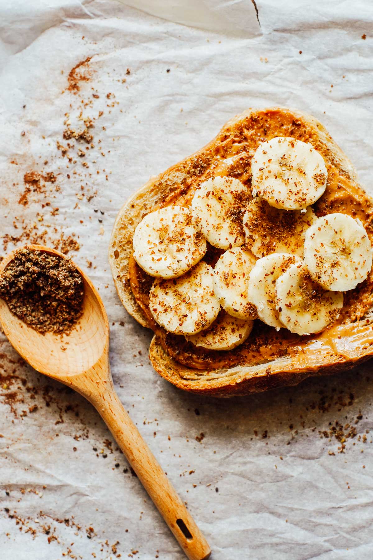 Toast with bananas, peanut butter, and flaxseeds.