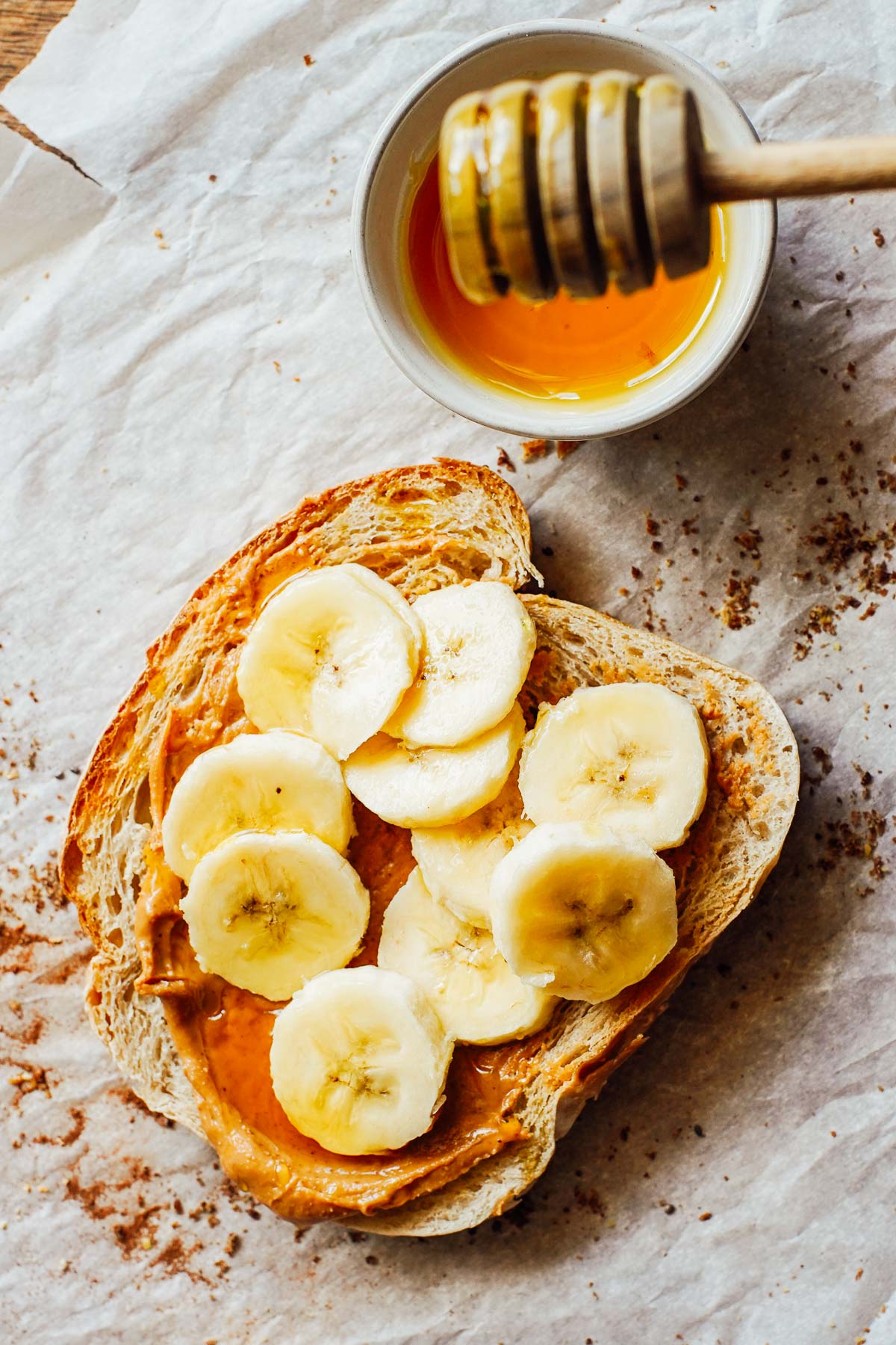 Toast with peanut butter, banana, and honey.