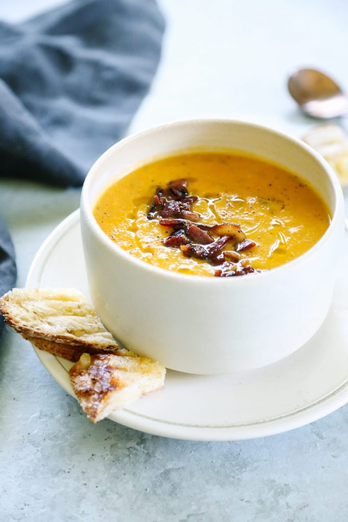 So good! This creamy roasted butternut squash soup is my absolute favorite fall soup, and it's so easy to make. Just roast and blend. No dairy!