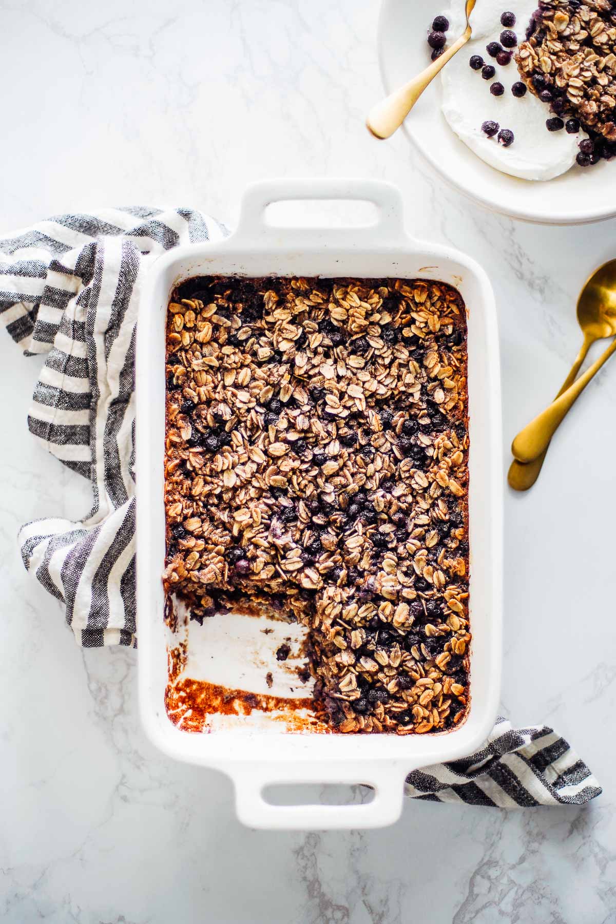 Baked blueberry oatmeal in a casserole dish.