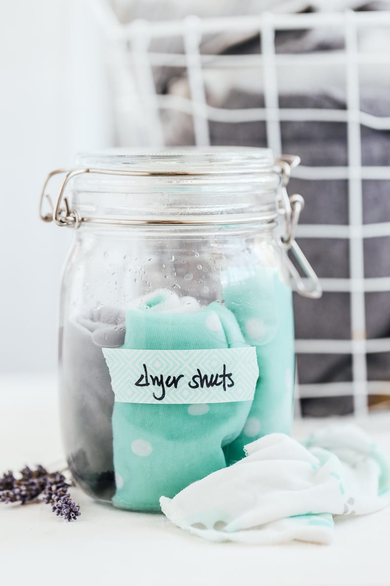 Homemade dryer sheets in a glass jar. 