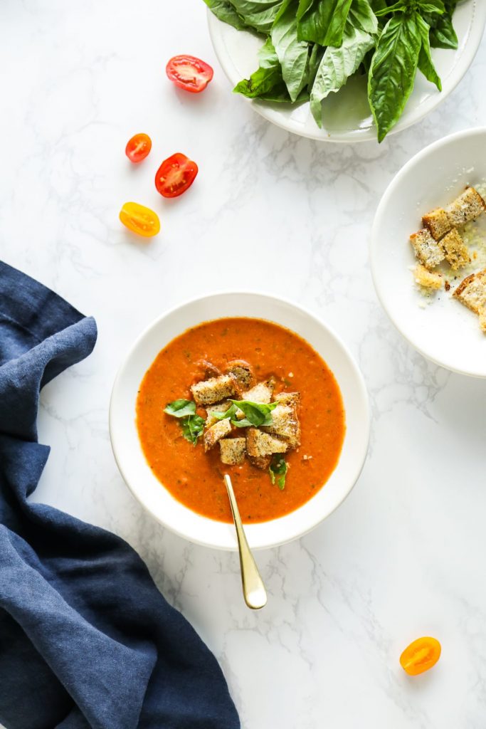 A seasonal fresh tomato soup featuring roasted red pepper, fresh tomatoes, basil, and nourishing broth. So easy and fast!